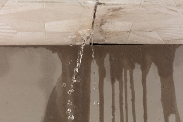 Professional Flood Damage Cleanup technician working in Georgetown, CT